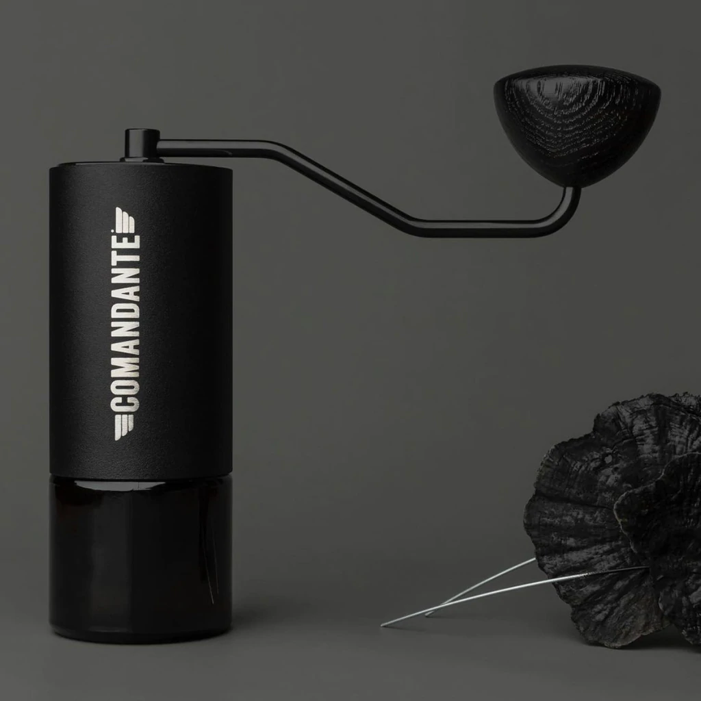 Black Comandante C40 MK4 Nitro Blade manual coffee grinder with ceramic burrs and sleek design.