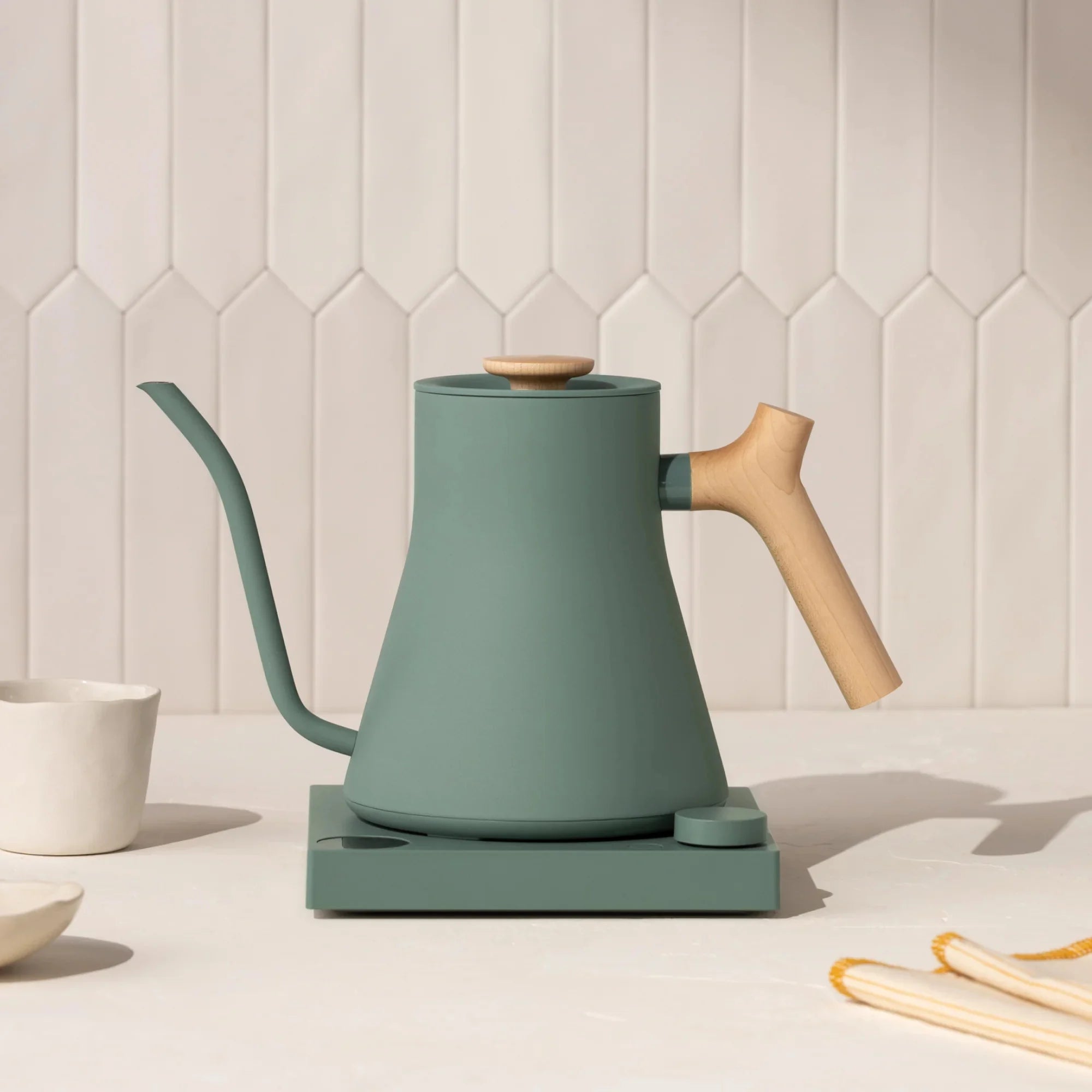 Fellow Stagg Matte Kettle in white with a sleek, modern design and ergonomic handle for precise pouring and tea or coffee brewing.