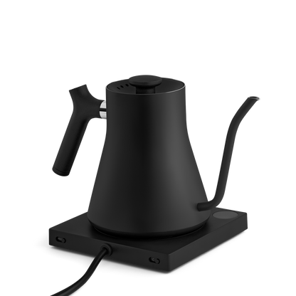 Fellow Stagg matte kettle in white with a sleek spout and handle, designed for precise pour-over brewing.