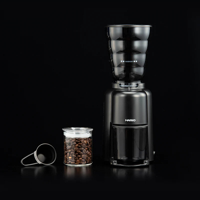 Hario V60 Electric Coffee Grinder Compact in black, with a sleek design and burr grinding mechanism for fresh coffee.