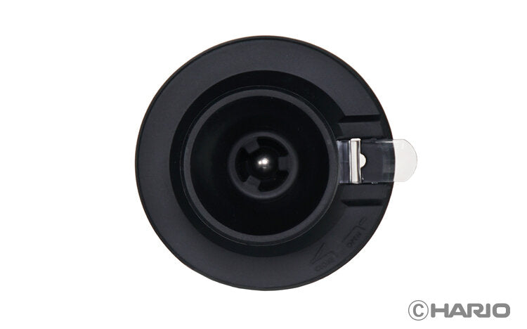 HARIO Mugen Switch black coffee grinder with ceramic burrs and compact design for precise coffee grinding.