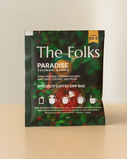 Fresh Colombia drip coffee beans from The Folks, showcasing a pack of Arabica coffee beans with floral and citrus notes.