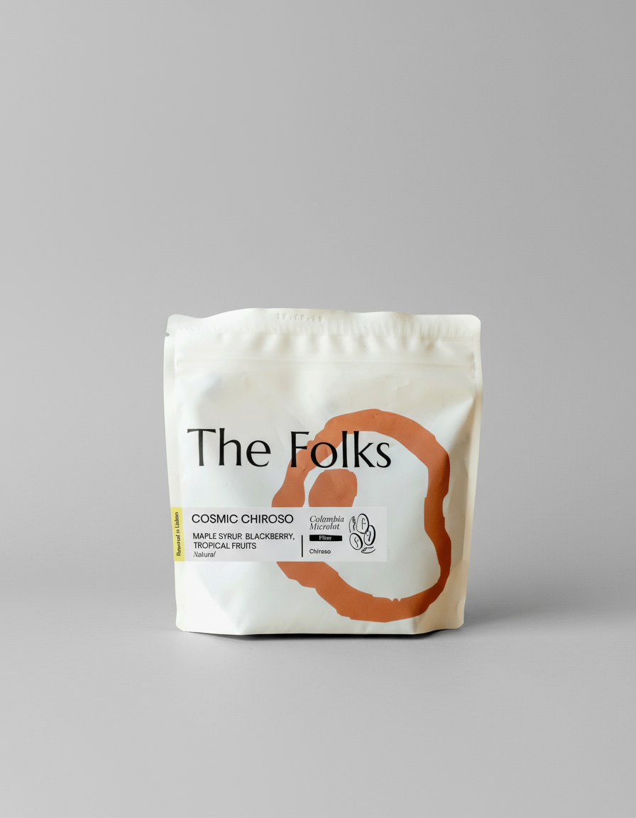 Organic Cosmic Chiroso beans by The Folks, Colombian coffee beans in a 250g package, displayed in a clear bag.