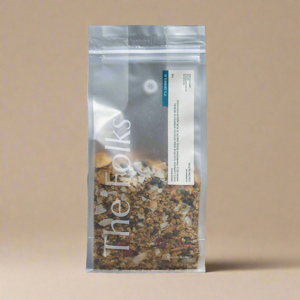 A 1kg bag of The Folks granola with crunchy clusters and oats, showcasing a close-up of the wholesome, toasted granola.