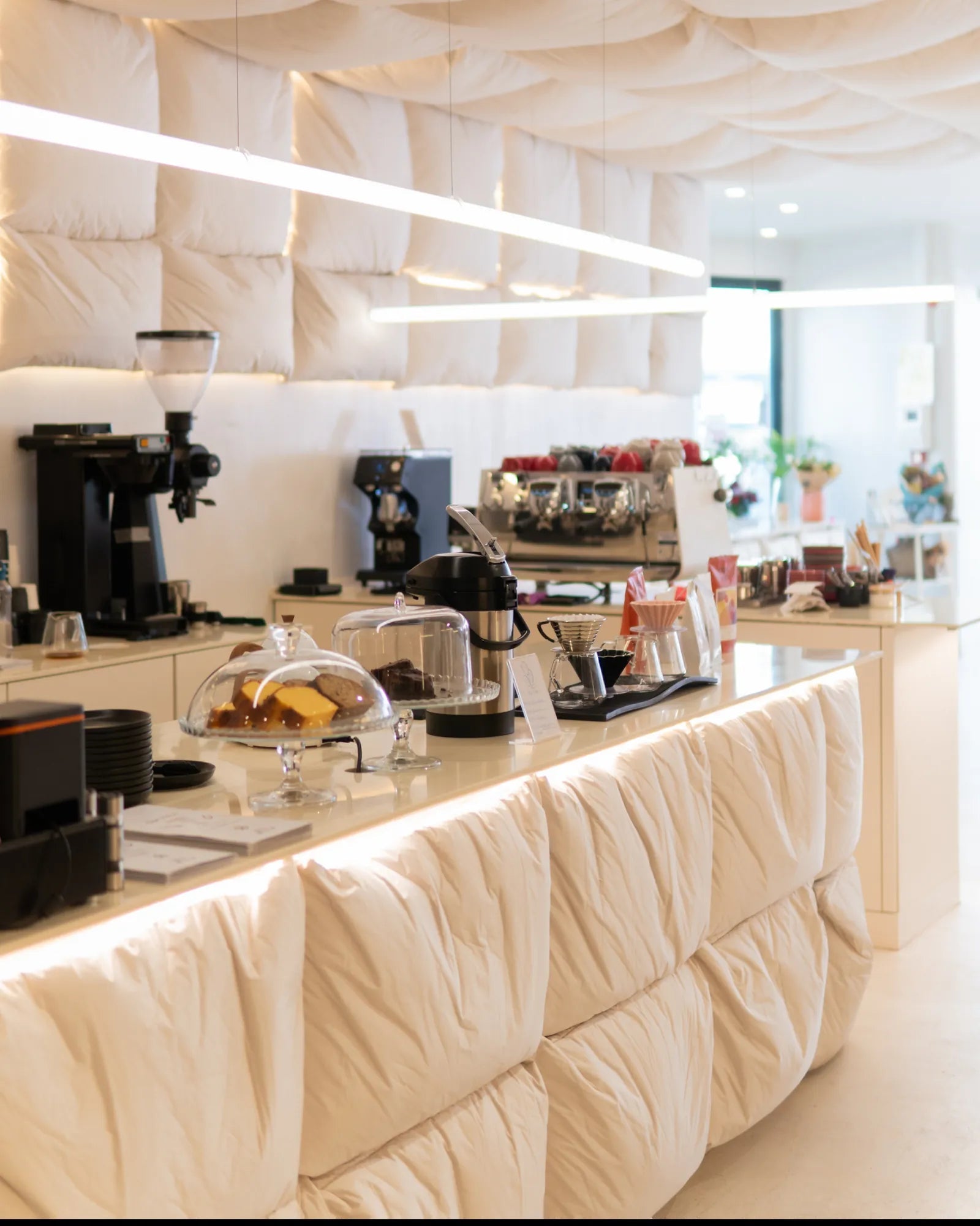 The Folks coffee bar with grinder, espresso machine and filter setup ready to serve